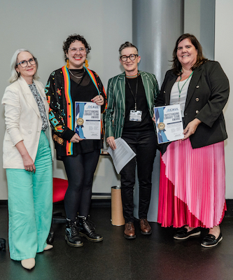 Members of the University of Queensland Library Collections on Country Project Working Group receive the CAUL Outstanding Library Team Award. From left to right: CAUL CEO Jane Angel, Raelee Lancaster, CAUL Board Chair Nicole Clark, and Anna Lagos