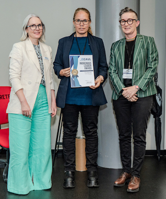 Tui Raven (center) from Deakin University receives the CAUL Indigenous Leader Award - Australia from CAUL CEO Jane Angel (left) and CAUL Board Chair Nicole Clark (right)